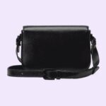 has been established as one of the most distinctive elements among the House symbols borrowed from the equestrian world. Presented on a small flap shoulder bag
