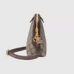 the shoulder bag has a domed shape that recalls vintage designs. The Double G—an archival code—appears atop a leather tab detail and on the zipper pull.