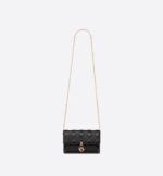 sans-serif; background-color: #f6f6f6;">The Lady Dior pouch is a compact yet spacious companion. Crafted in black lambskin with Cannage stitching