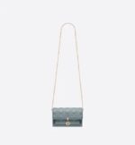 sans-serif; background-color: #f6f6f6;">The Lady Dior pouch is a compact yet spacious companion. Crafted in cloud blue lambskin with Cannage stitching