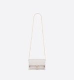 sans-serif; background-color: #f6f6f6;">The Lady Dior pouch is a compact yet spacious companion. Crafted in latte lambskin with Cannage stitching