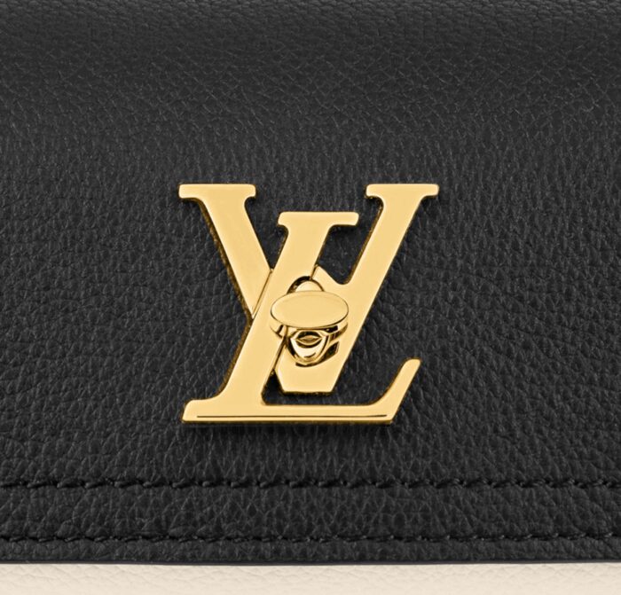 The Lockme Tender Pochette is crafted from grained calf leather. Inspired by the Lockme Tender bag