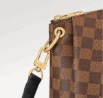 the Odeon Tote MM handbag is for those looking for a spacious and easy-to-wear carryall. The gold-color side rings and eyelets