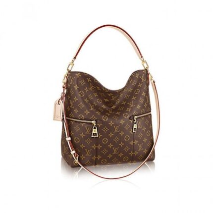 35.0 x 42.0 x 13.0 cm (Length x height x width ) •Monogram coated canvas •Natural cowhide leather trim •Microfiber lining •Golden color metallic pieces •Removable short shoulder handle in natural cowhide leather •Removable longer shoulder strap in natural cowhide leather •Customizable name tag •2 outside zipped pockets with engraved metal pulls •1 inside flat pocket •Double smartphone pocket •4 bottom studsMore Information