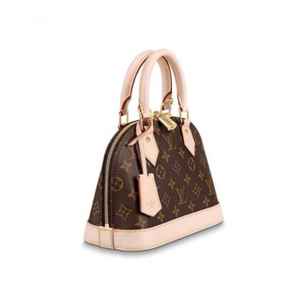 introduced in 1934. Signature details impart a timeless elegance to this model crafted from iconic Monogram canvas: note the golden padlock and keys