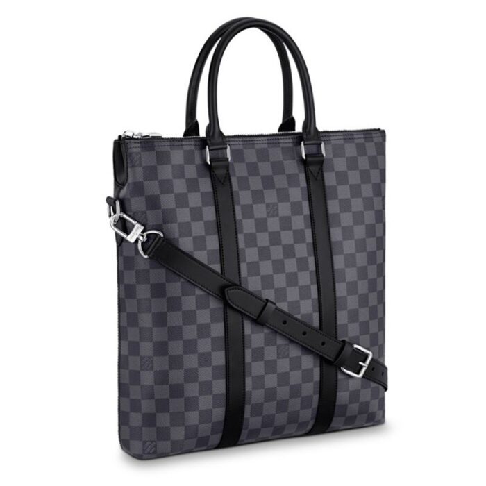 13.2 x 14.4 x 2.7 inches•Leather handles•Adjustable and removable leather shoulder strap•Zip closure•1 exterior pocket with magnetic closure•2 interior flat pockets•1 interior iPad pocket•1 padded laptop compartment•Damier Graphite coated canvas•Textile lining•Cowhide leather trim•Silver color metallic pieces
