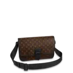 The sophisticated Archy Messenger MM bag is made from Monogram Macassar canvas with black-leather trim. Details such as the adjustable and removable Jacquard strap signed Louis Vuitton and leather corners and piping