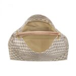 its exquisite handcrafted leather handle adds a luxurious crowning touch.