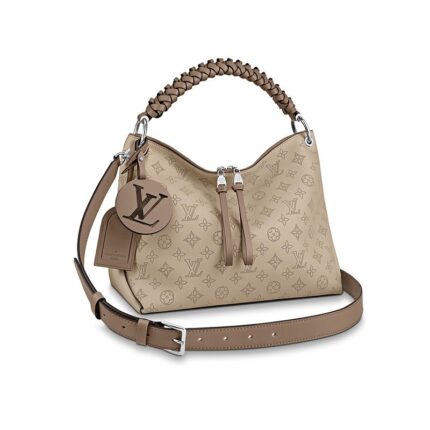 The Beaubourg Hobo MM bag is made from Mahina calf leather perforated with the Monogram pattern. It boasts a stylishly braided-leather top handle