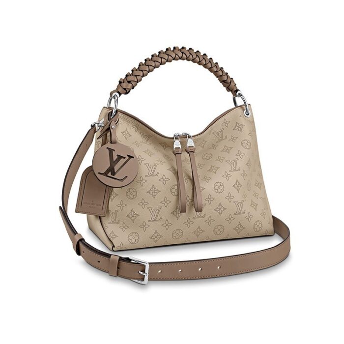 The Beaubourg Hobo MM bag is made from Mahina calf leather perforated with the Monogram pattern. It boasts a stylishly braided-leather top handle