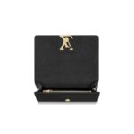 smooth calfskin leather with a beautiful golden chain and opening clasp to make a truly elegant clutch.