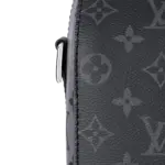 the iconic Monogram pattern is inverted on the side panels for a playful touch. Easy to wear with its removable signature strap