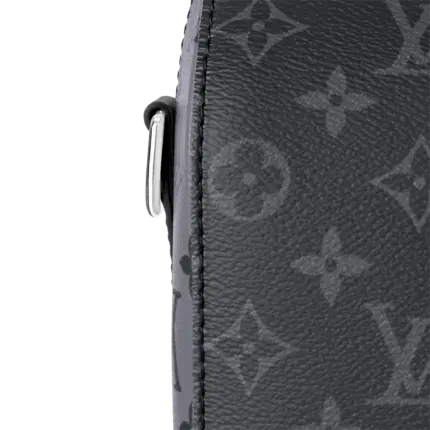 the iconic Monogram pattern is inverted on the side panels for a playful touch. Easy to wear with its removable signature strap