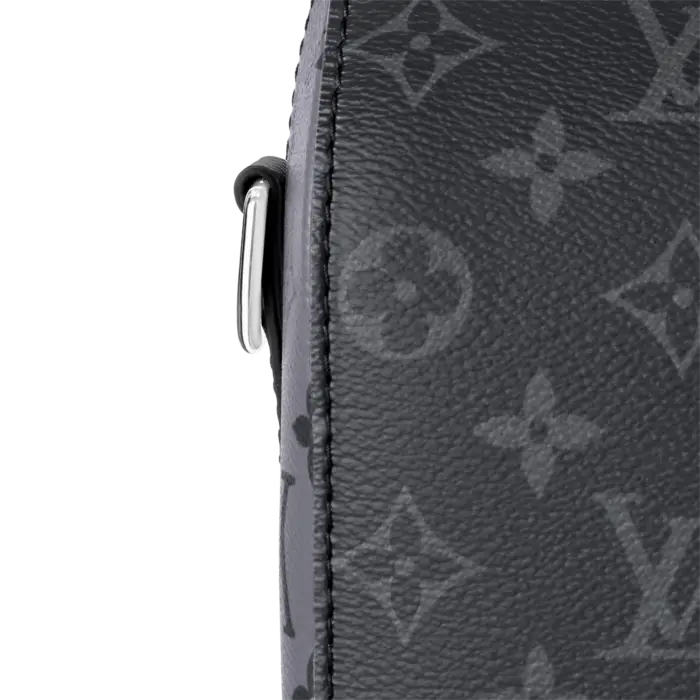 the iconic Monogram pattern is inverted on the side panels for a playful touch. Easy to wear with its removable signature strap