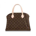 the vintage-inspired Boursicot pouch makes a unique statement. Crafted in the House’s signature Monogram canvas