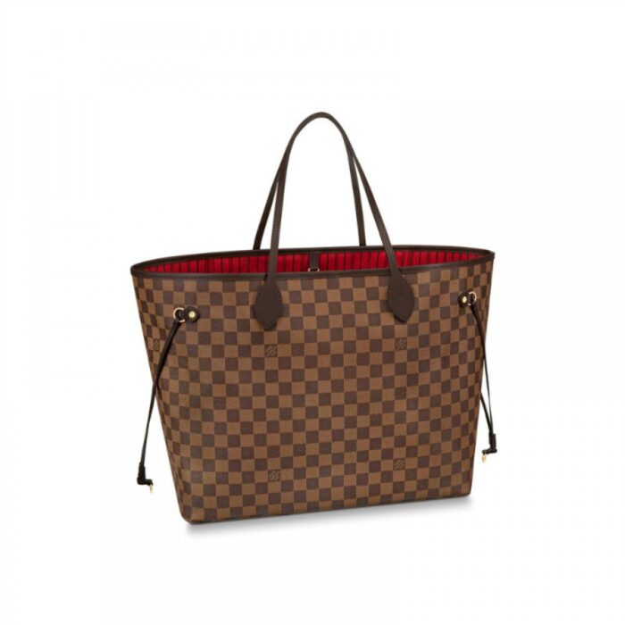 practical tote. The slim leather handles fit over the shoulder or on the arm. Shown here in Damier Ebene's canvas.