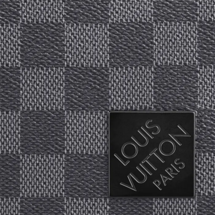 the new District PM in Damier Graphite coated canvas has been revamped to emphasize the purity and proportions of this emblematic messenger bag. The outside zipped pocket and inside pockets keep things organized. The adjustable strap