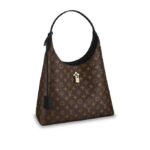 This casual-chic hobo style in the Maison's iconic canvas features a Monogram Flower padlock in shiny golden metal