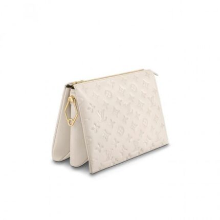 the Coussin PM handbag is made from Monogram-embossed puffy lambskin. It can be worn cross-body with the strap