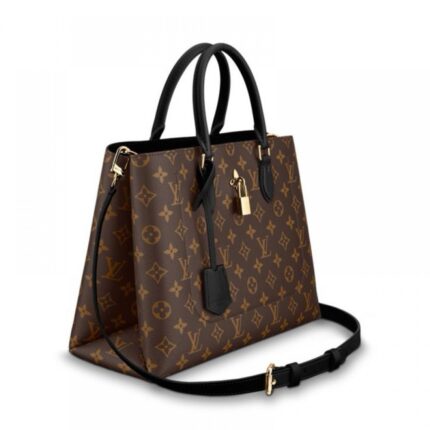 removable leather shoulder strap•2 articulated Toron leather handles•Flower shaped padlock•Central compartment with zipped closure •2 flat inside pockets•4 protective bottom studs