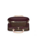 this functional tote is embellished with a distinctive Monogram Flower padlock in gleaming golden metal. The smooth leather handles and detachable strap provide a variety of carry options
