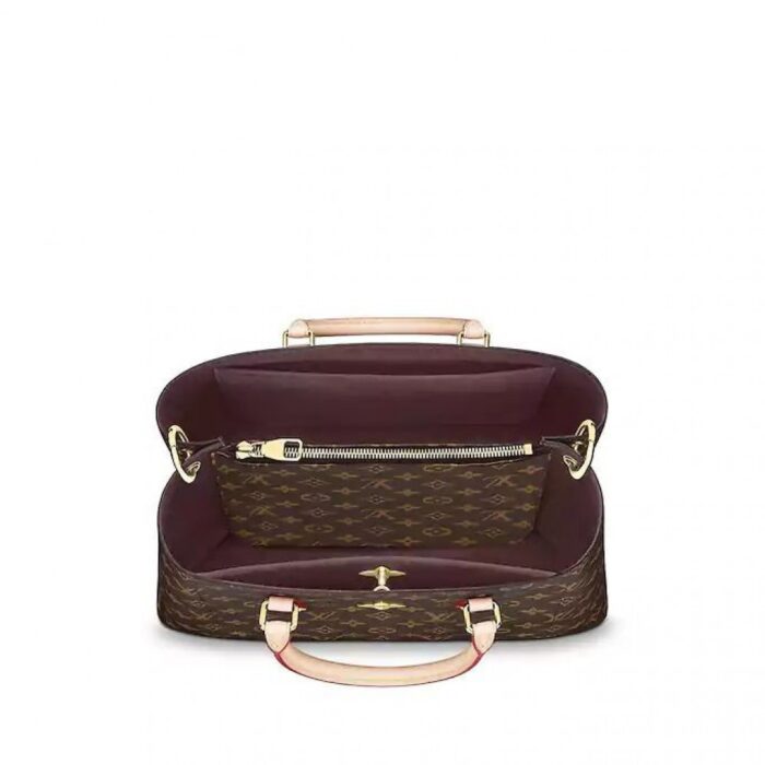 this functional tote is embellished with a distinctive Monogram Flower padlock in gleaming golden metal. The smooth leather handles and detachable strap provide a variety of carry options