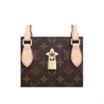 and the well-organized interior easily holds files and a laptop.DETAILED FEATURES•13.4 x 9.5 x 5.1 inches•Monogram coated canvas•Smooth calf-leather trim•Microfiber lining•Golden-color metallic pieces•Adjustable