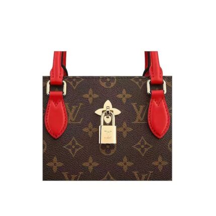 this functional tote is embellished with a distinctive Monogram Flower padlock in gleaming golden metal. The smooth leather handles and detachable strap provide a variety of carry options