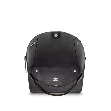 and the tote transforms into a trendy bucket style. Crafted of perforated calf leather