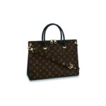 The glamorous Pallas combines iconic Monogram canvas with colorful grained leather for a very feminine