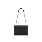 the Vavin PM handbag is signed with a bold