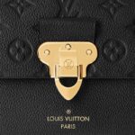 it is a chic yet relaxed model that moves with ease from day to evening. The adjustable chain-and-leather handle adapts to shoulder or cross-body wear.Detailed Features9.84 x 6.69 x 3.74 inches(Length x Height x Width)•Black•Embossed supple grained cowhide leather and supple grained cowhide leather•Supple grained cowhide leather trim•Microfiber lining•Gold-color hardware•Lock closure•Adjustable chain-and-leather strap•Front open pocket•Inside zipped pocket
