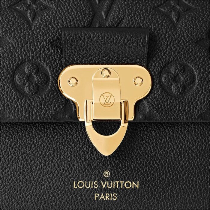 it is a chic yet relaxed model that moves with ease from day to evening. The adjustable chain-and-leather handle adapts to shoulder or cross-body wear.Detailed Features9.84 x 6.69 x 3.74 inches(Length x Height x Width)•Black•Embossed supple grained cowhide leather and supple grained cowhide leather•Supple grained cowhide leather trim•Microfiber lining•Gold-color hardware•Lock closure•Adjustable chain-and-leather strap•Front open pocket•Inside zipped pocket