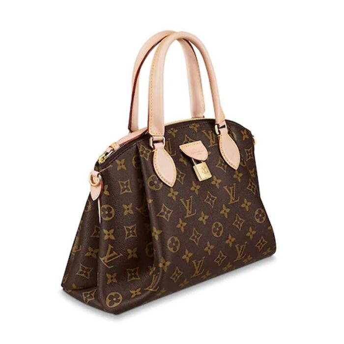 it opens wide to provide easy access to belongings. Two flat top handles and a removable and adjustable strap in VVN Natural cowhide afford a host of stylish carries