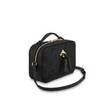 this edition of the Saintonge handbag is detailed with playful tassels and shiny golden hardware. Sized to fit a woman’s daily essentials