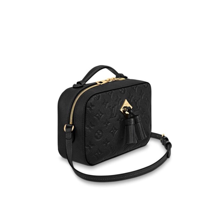 this edition of the Saintonge handbag is detailed with playful tassels and shiny golden hardware. Sized to fit a woman’s daily essentials