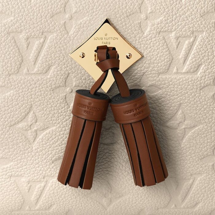 max. 61 cm/24 inches) for shoulder or cross body carry•Flat inside pocket•Double-zip closure•Double tassels attached to metal plate