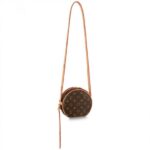 Nicolas Ghesquiere created this miniature version of the Boite Chapeau Souple for Spring-Summer 2020. In Monogram canvas with natural cowhide trim