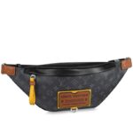 The Discovery Bumbag is revisited in Monogram Eclipse canvas with an embossed leather patch for the Gaston Labels Collection. This special edition was inspired by the vintage luggage labels collected by Louis Vuitton's grandson