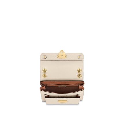 it makes a superb day-to-evening companion.Detailed Features20.5 x 15.0 x 8.0 cm(Length x Height x Width)•Crème Beige•Embossed supple grained cowhide leather and supple grained cowhide leather•Supple grained cowhide leather trim•Microfiber lining•Gold-color hardware•Metal signature lock•Sliding chain strap with 2 leather pads (drop: min. 28 cm/11 inches