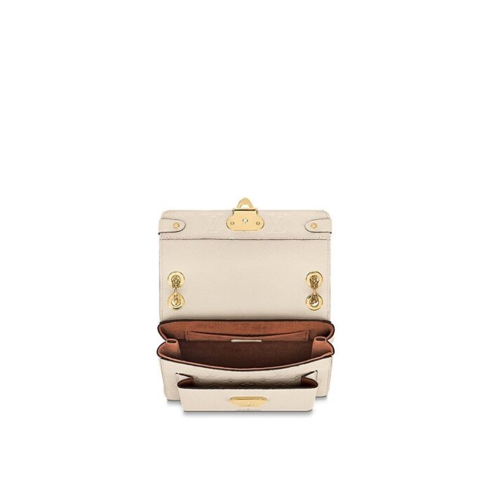 it makes a superb day-to-evening companion.Detailed Features20.5 x 15.0 x 8.0 cm(Length x Height x Width)•Crème Beige•Embossed supple grained cowhide leather and supple grained cowhide leather•Supple grained cowhide leather trim•Microfiber lining•Gold-color hardware•Metal signature lock•Sliding chain strap with 2 leather pads (drop: min. 28 cm/11 inches