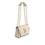 The new Vavin BB brings a contemporary twist to a classic bag. Its sophisticated mix of smooth and embossed Monogram Empreinte leather contrasts with the gold finish of the comfortable chain strap and the clasp modeled after Louis Vuitton’s historic trunk locks. Compact yet large enough to hold all the essentials