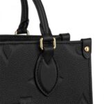 embossed with a subtle embossed Giant Monogram pattern. This smaller version of the original Onthego fits essentials such as an iPad Mini. Articulated top handles and an adjustable removable strap offer a variety of carry options.