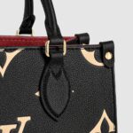 the OnTheGo PM tote is fashioned in Monogram Empreinte leather