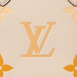 which easily fits essentials such as a laptop. A leather charm gives a playful spirit and highlights the LV craftsmanship.Detailed Features35 x 27 x 14 cm / 13.8 x 10.6 x 5.5 inches(Length x Height x Width)•Cream/Saffron•Embossed grained cowhide leather•Cowhide leather trim•Microfibre lining•Gold-colour hardware•Inside flat zipped pocket•Inside double pocket•Braided leather charm•Handle: Single x2More Information