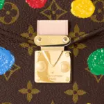 the LVxYK Pochette Métis is an upbeat variation on a classic bag. Monogram canvas is enlivened with one of the visionary Japanese artist’s signature themes: an array of brightly colored dots