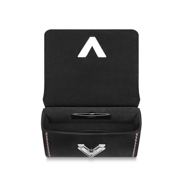max. 56 cm/22 inches) with leather pad for shoulder or cross body carry•Transforming signature LV twist-lock•Inside flat pocket with removable mirror•Large inside pocket