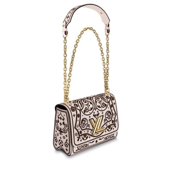 max. 56 cm – 22.0 inches) with leather pad for shoulder or cross-body carry•Transforming signature LV twist-lock•Inside flat pocket with removable mirror•Large inside pocket