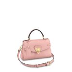 This Georges BB bag offers a sophisticated way to wear Louis Vuitton's most iconic motif: embossed Monogram Empreinte leather is combined with supple grained cowhide. The secure signature clasp is inspired by the locks on the House’s historic trunks. Multiple carry options and a spacious double interior make this a practical