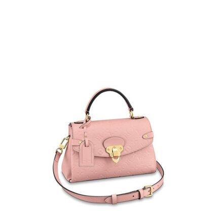 This Georges BB bag offers a sophisticated way to wear Louis Vuitton's most iconic motif: embossed Monogram Empreinte leather is combined with supple grained cowhide. The secure signature clasp is inspired by the locks on the House’s historic trunks. Multiple carry options and a spacious double interior make this a practical